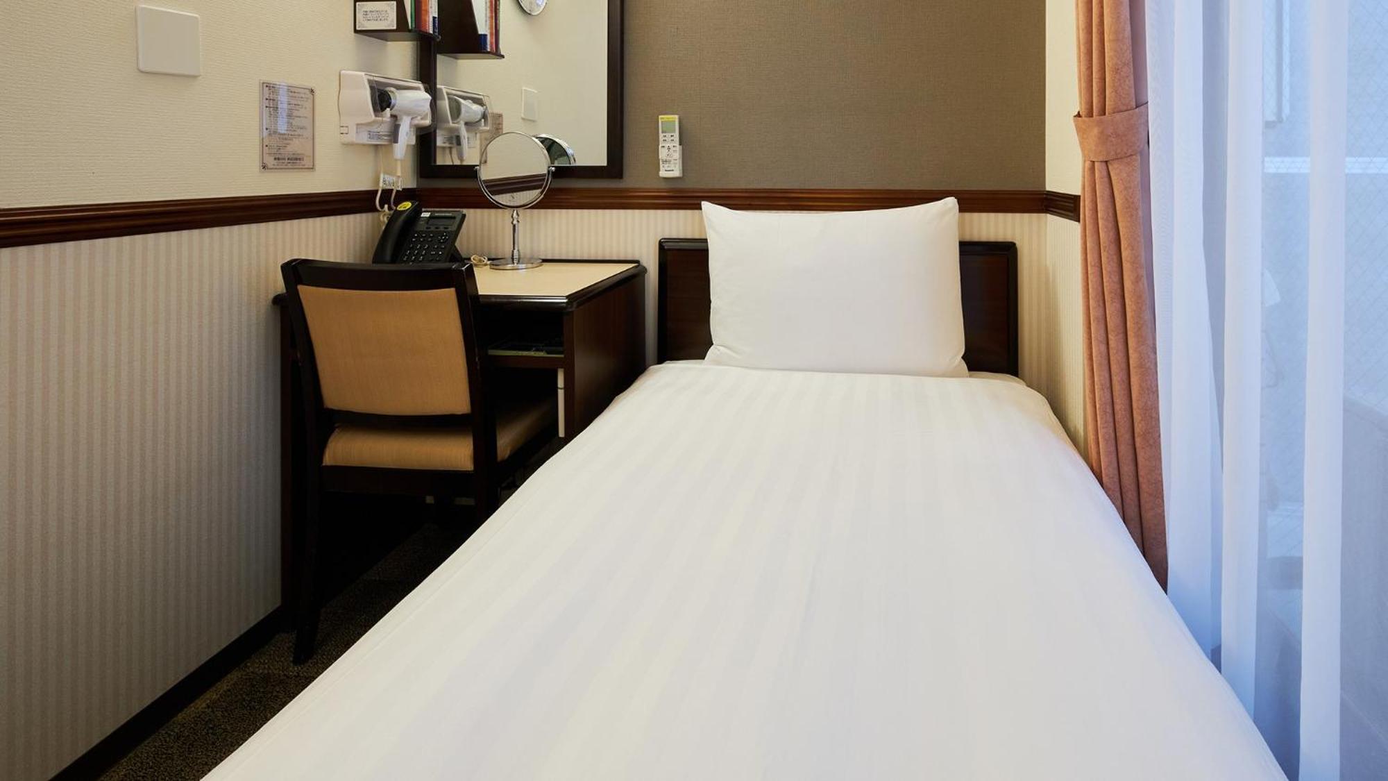 Toyoko Inn Tsudanuma-Eki Kita-Guchi Фунабасі Номер фото
